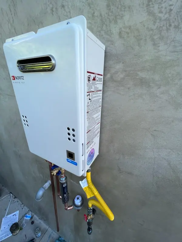 Tankless water heater installation for Kellogg School homes